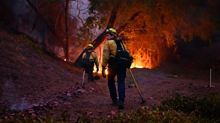 16 dead, 16 missing as fire crews try to corral Los Angeles blazes before winds return this week.